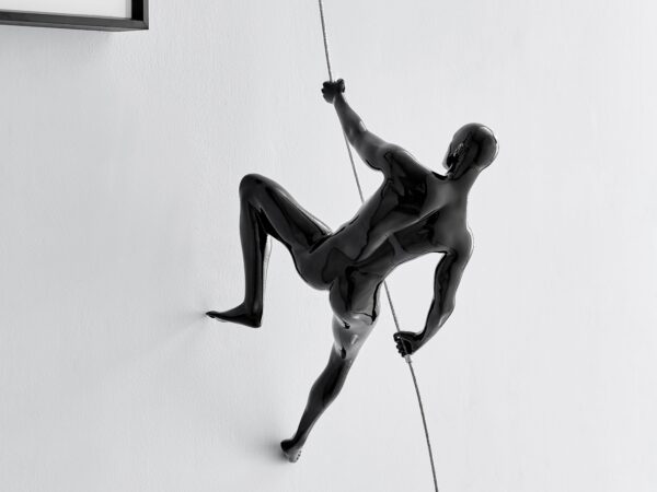 Glossy Black Wall Sculpture Climbing 15" Man